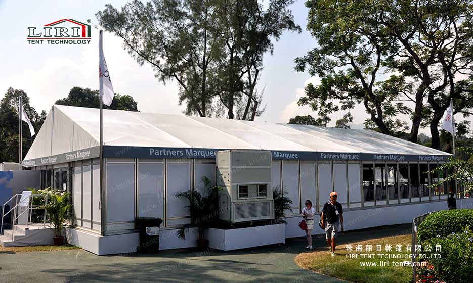 white event tent with solid walls