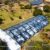 Orangery tent outdoor event aerial view with transparent roof and garden setting